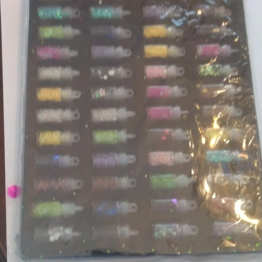 Forty eight Bottles of Glitter